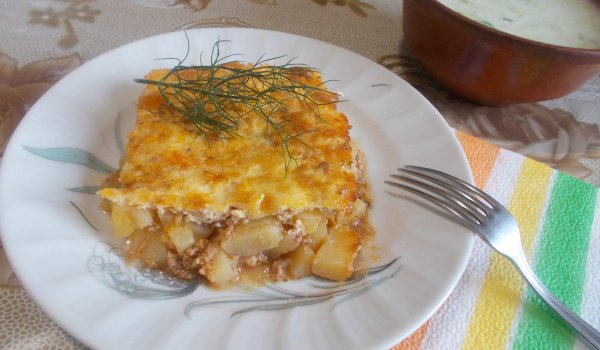 Мусака със заливка от моцарела