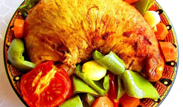 Телешка глава, печена в шкембе